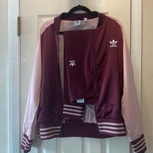 Adidas track suit. Size medium. Burgundy and pink. Very good condition